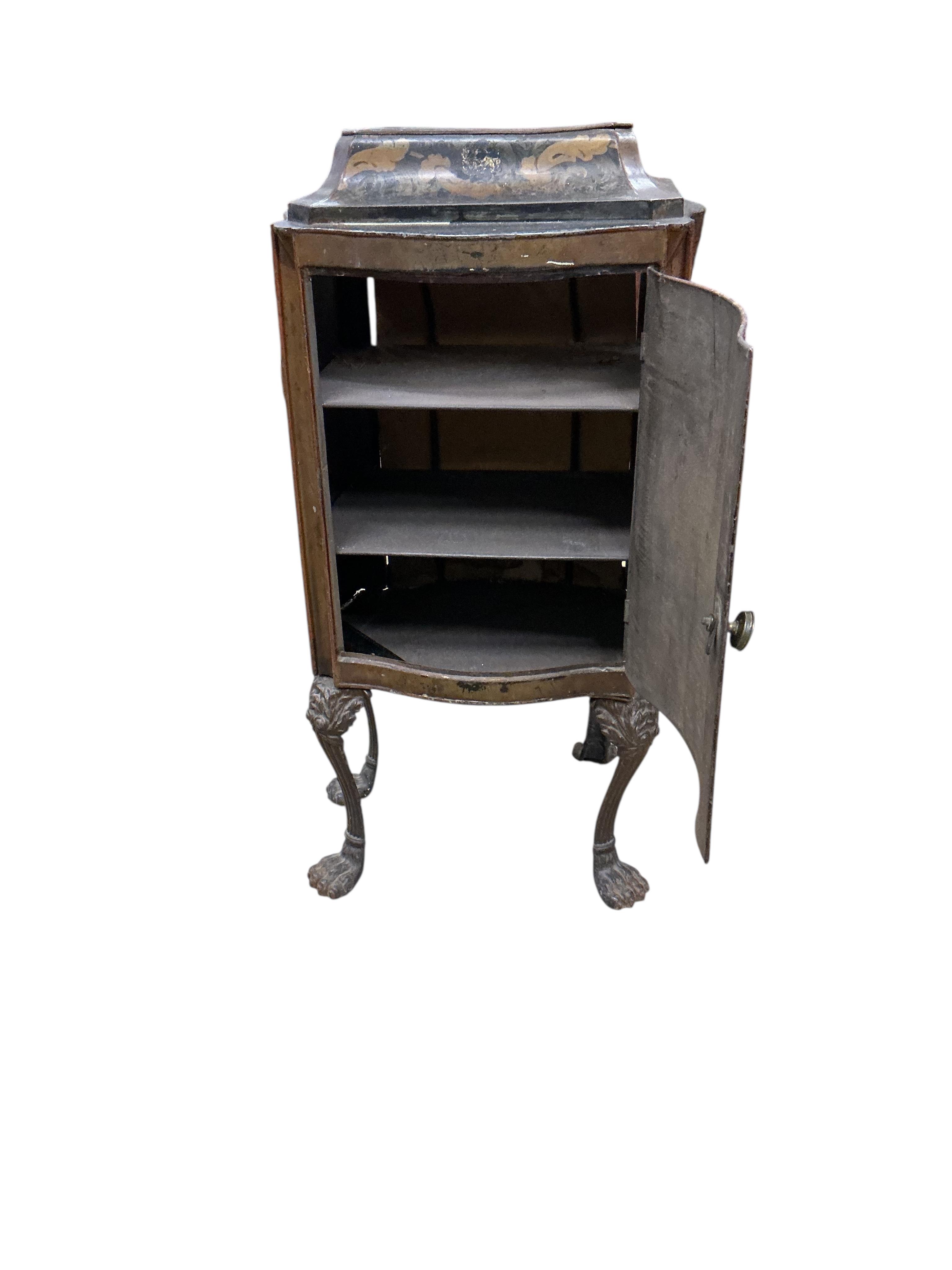 An early 19th century toleware serpentine cabinet, with gilt decoration, width 40cm, depth 30cm, height 76cm